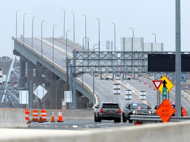 The collapsed Francis Scott Key Bridge is seen in the background of the on ramp to the bridge in Baltimore, Maryland. Picture: Getty Images via AFP