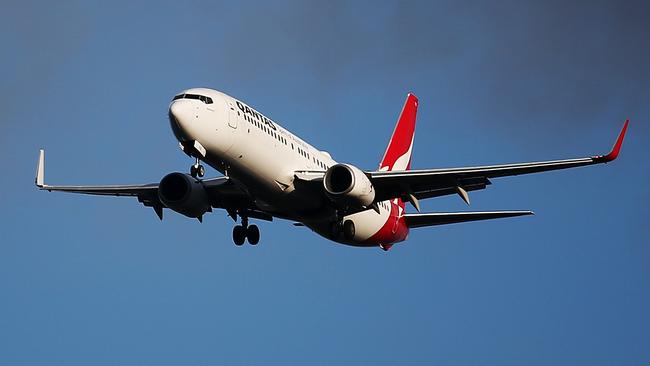 An Qantas passenger jet flies through stormy skies. The Australian aviation industry has hit turbulence since the outbreak of the COVID-19 coronavirus, with passenger numbers falling dramatically with statewide lockdowns and border closures. But the dark clouds are clearing, with the federal government creating the Australian Airline Financial Relief Package, with $715 million of financial assistance for domestic airlines. Picture: Brendan Radke