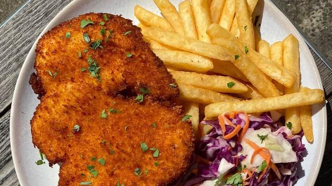 A typical chicken schnitzel with chips and salad. Picture: Supplied