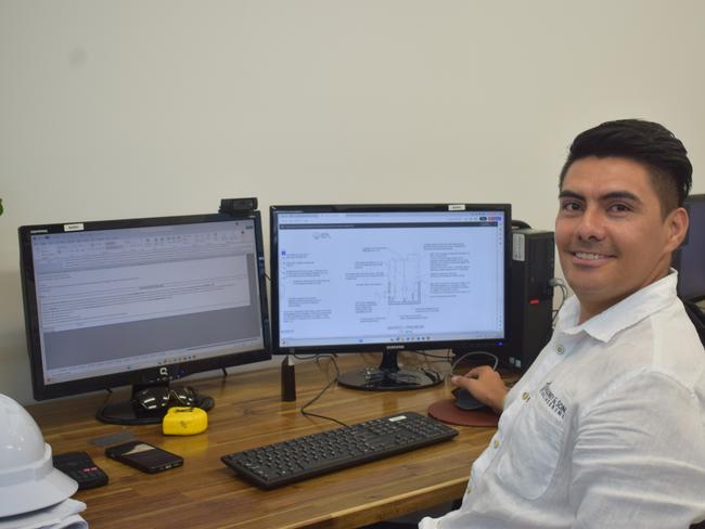 Moloney and Sons Engineering employer Mario Guevara at his desk.