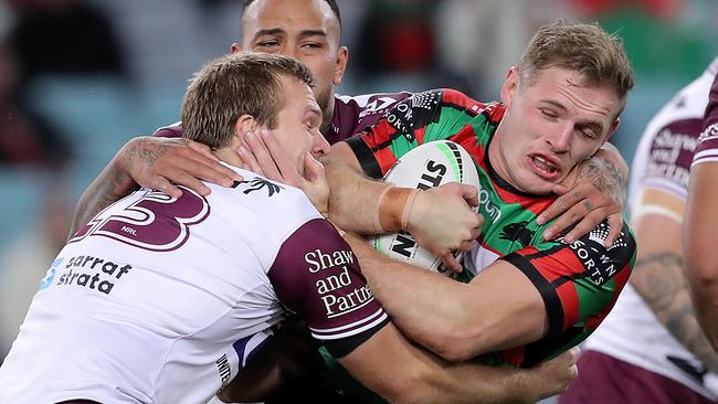 SYDNEY, AUSTRALIA - AUGUST 22:  Thomas Burgess of the Rabbitohs is tackled during the round 15 NRL match between the South Sydney Rabbitohs and the Manly Sea Eagles at ANZ Stadium on August 22, 2020 in Sydney, Australia. (Photo by Matt King/Getty Images)