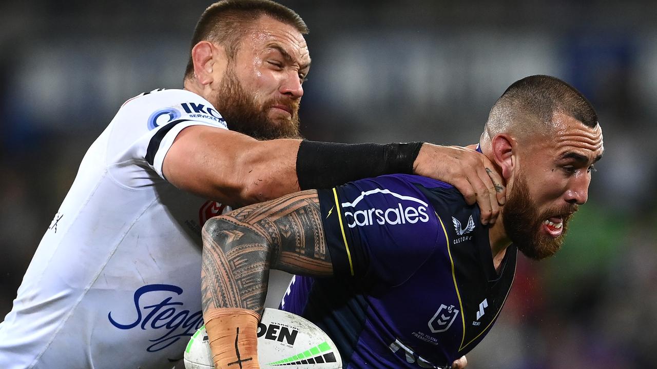 MELBOURNE, AUSTRALIA - AUGUST 26: Nelson Asofa-Solomona of the Storm is tackled by Jared Waerea-Hargreaves of the Roosters during the round 24 NRL match between the Melbourne Storm and the Sydney Roosters at AAMI Park on August 26, 2022, in Melbourne, Australia. (Photo by Quinn Rooney/Getty Images)