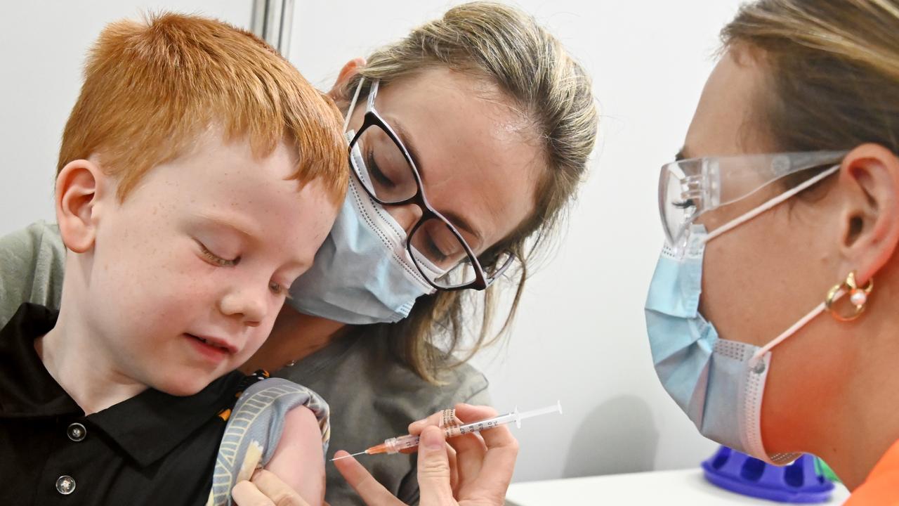 Jake Washington, 5, receives his first dose of the Covid-19 vaccine. Picture: Julianne Osborne