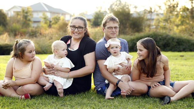 Jess Falconer and Chris Schmidt recently had twins Chelsea and Ava. They are pictured with their older girls Chloe (left) and Lily (right). Picture: Sam Ruttyn