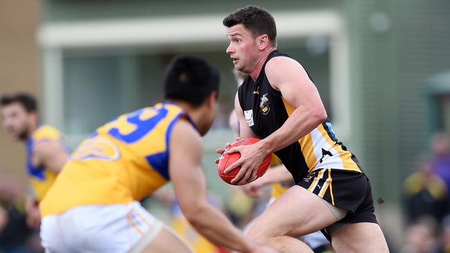 Tom Roach on the go for Balwyn. Picture: Steve Tanner