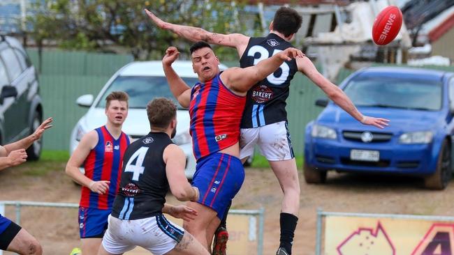 Action from the Blackfriars Old Scholars v Hope Valley division five game. Picture: Brayden Goldspink