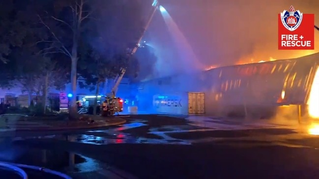 Fire crews tackle Moorebank factory fire on July 9