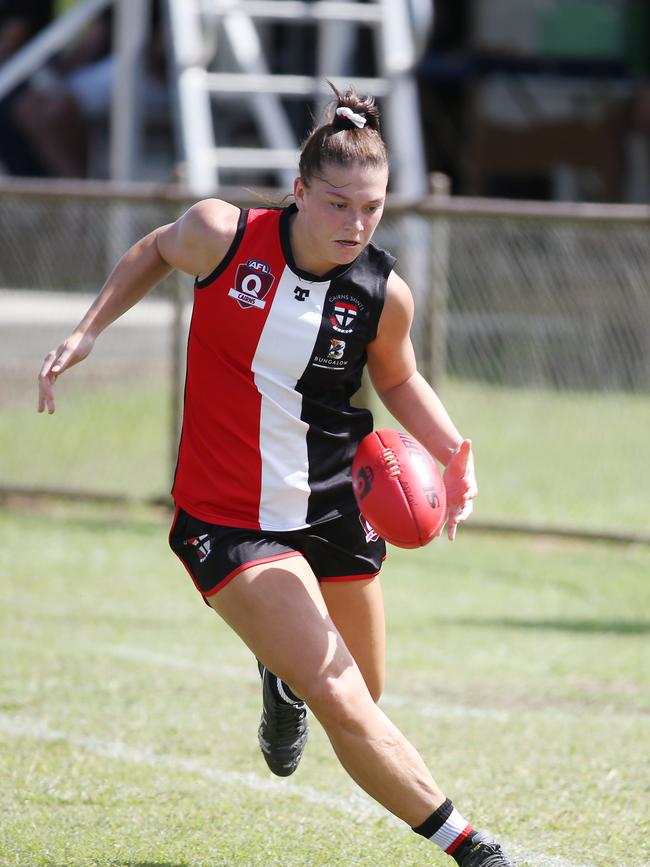 Saints' Poppy Boltz keeps the ball in the field of play in the AFL Cairns Women's match between the Cairns Saints and the Cairns City Lions, held at Griffiths Park, Manunda. Picture: Brendan Radke