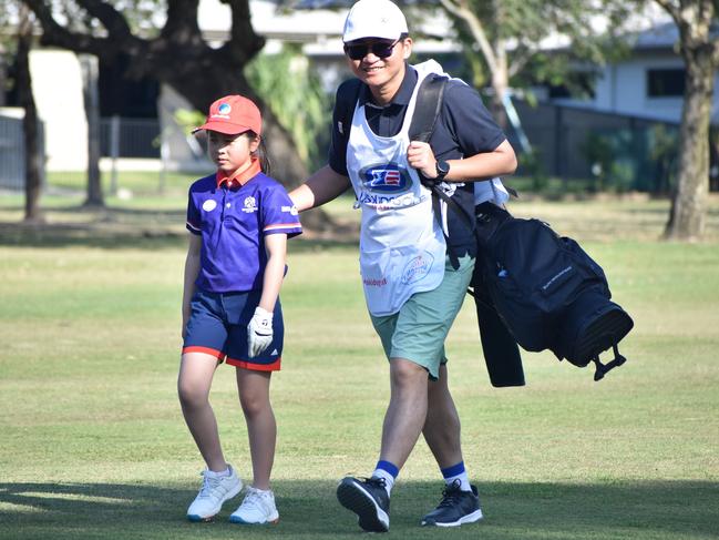 Melbourne's Lilian Bu (girls eight years and under) and Yeding Bu head to the green at the US Kids Golf Foundation Australian Open at the Rockhampton Golf Club on September 27.