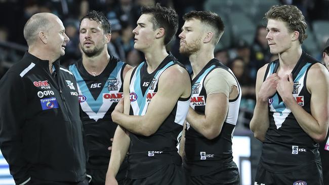 Ken Hinkley stands with Travis Boak, Connor Rozee, Robbie Gray and Xavier Duursma after the one-point loss against GWS Giants. Picture: SARAH REED