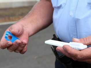 DRUG DETECTOR: Drivers lick the pads on the blue section in a road-side test for cannabis and methamphetamine in the saliva.