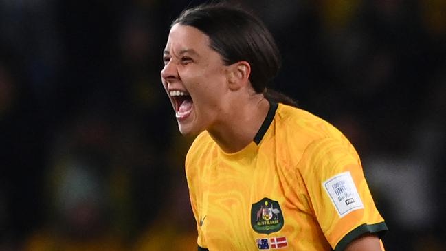 Australia's forward #20 Sam Kerr celebrates at the end of the Australia and New Zealand 2023 Women's World Cup round of 16 football match between Australia and Denmark at Stadium Australia in Sydney on August 7, 2023. (Photo by FRANCK FIFE / AFP)