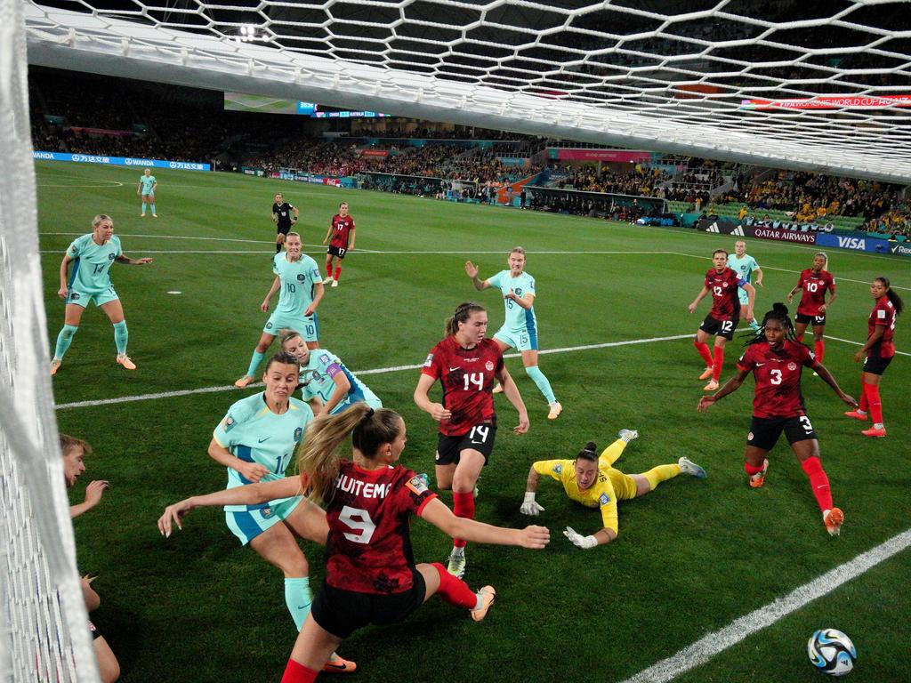 A goal line scramble as Hayley Raso pokes the ball into the net versus Canada in Melbourne. Picture: Robert Cianflone/Getty Images