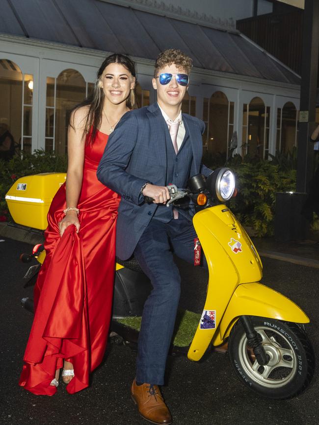 Graduate Grant Eldridge-Hayes and partner Abby Patchett arrive on a moped to the Toowoomba Flexi School formal at Burke and Wills Hotel, Thursday, October 20, 2022. Picture: Kevin Farmer