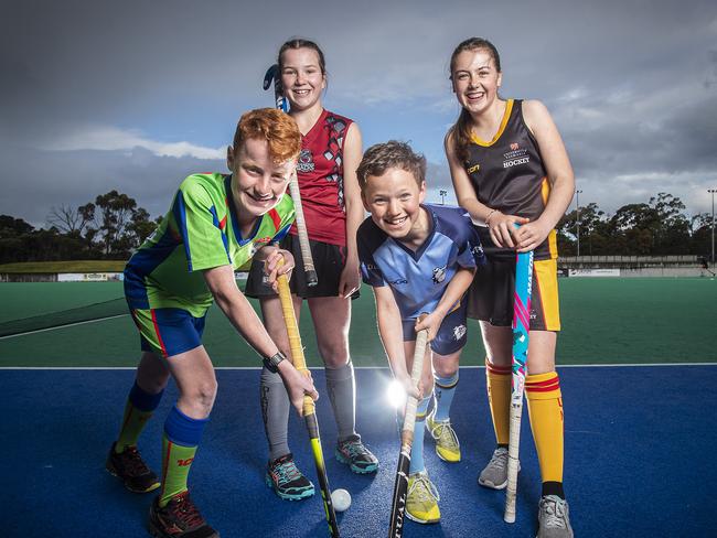 Junior hockey players (L-R) OHA's Jack Woodberry, DiamondBacks' Wilhelmina Fish, Angus McMullen from North-West Grads and University's Audrey Bullard.Picture: LUKE BOWDEN