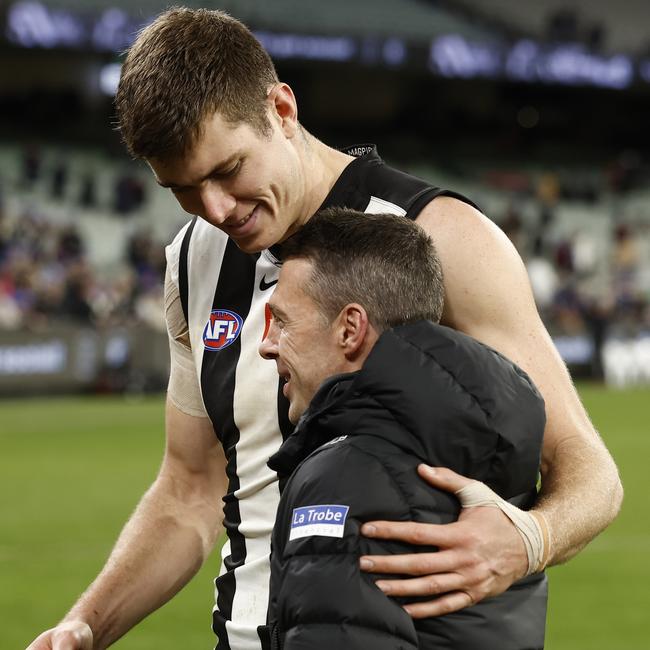 Mason Cox and Craig McRae embrace. Picture: Getty Images