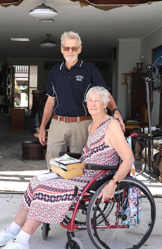 Residents survey the damage at Helensvale caused by wild weather Xmas night. The home of Trish and Bob Avery had its roof ripped off during the storm.. .Picture Glenn Hampson