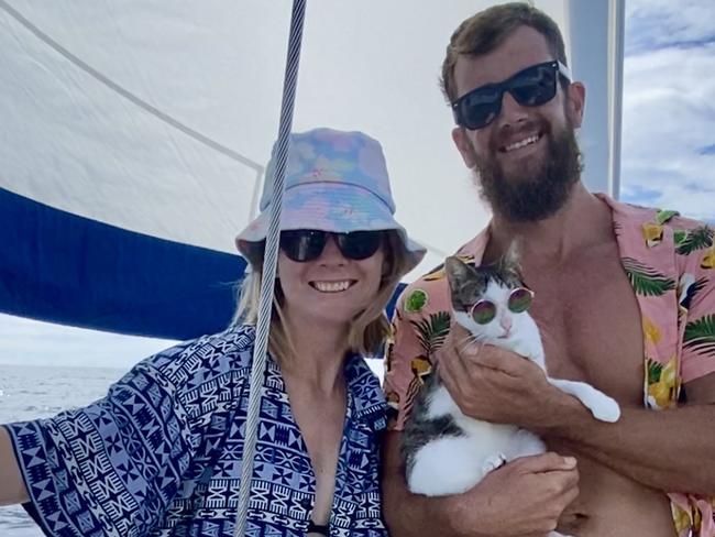 South Australian's Tess Wilson and Brett (surname to come) with cat Coco are sailing on, yacht Complicite after swapping jobs in Adelaide for adventures at sea., Pictures supplied by Tess Wilson