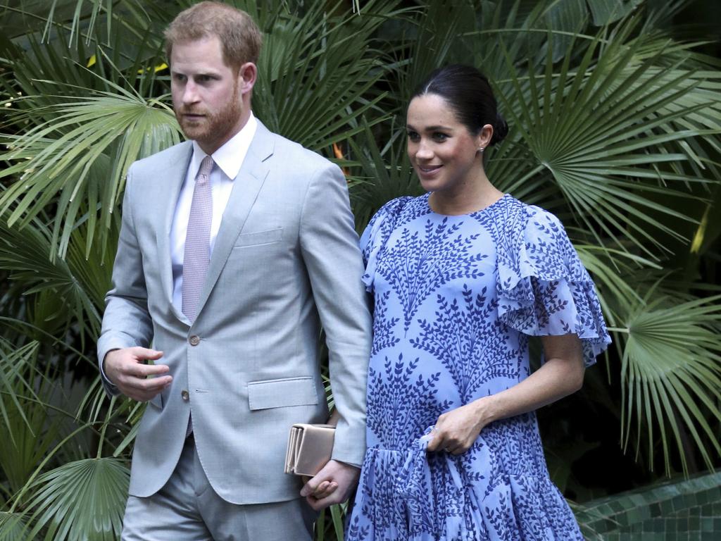 Meghan looked radiant as she stepped out with Harry. Picture: AP