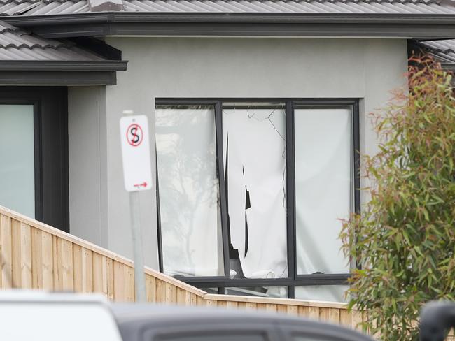 A broken window at the Donnybrook house where a man was fatally shot. Picture: David Crosling