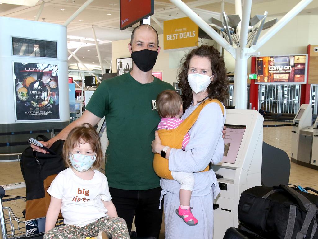 Nicholas and Erin Reggars with Hazel, 3 and Genevieve, 1 are flying back home to Portland on the direct flight which saved them six hours in the air. Picture: Steve Pohlner