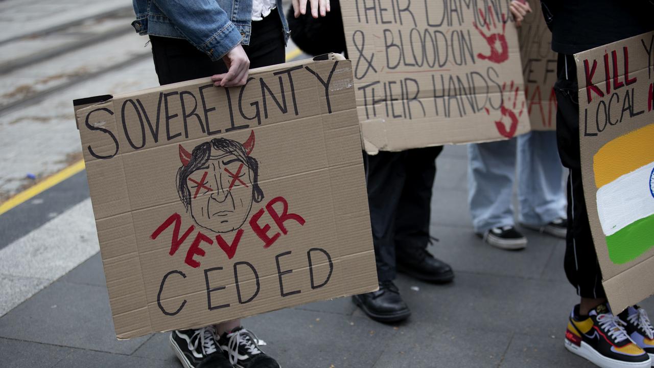 Signs at Sydney’s ‘Abolish the Monarchy’ protest. Picture: NCA NewsWire / Nikki Short