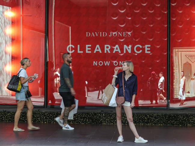 SYDNEY, AUSTRALIA - DECEMBER 26: Shoppers are seen outside David Jones Department store during Boxing Day sales on December 26, 2022 in Sydney, Australia. Retailers offer massive discounts and enticing deals on the boxing day public holiday in Australia, attracting many shoppers who are keen to take advantage of bargains once Christmas is over. (Photo by Roni Bintang/Getty Images)