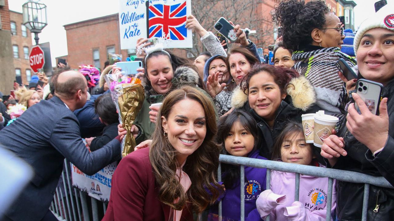 Princess Catherine appeared thrilled to be among crowds of well wishes, many of whome had waited hours in the cold to catch a glimpse of the royal couple. Picture: AFP