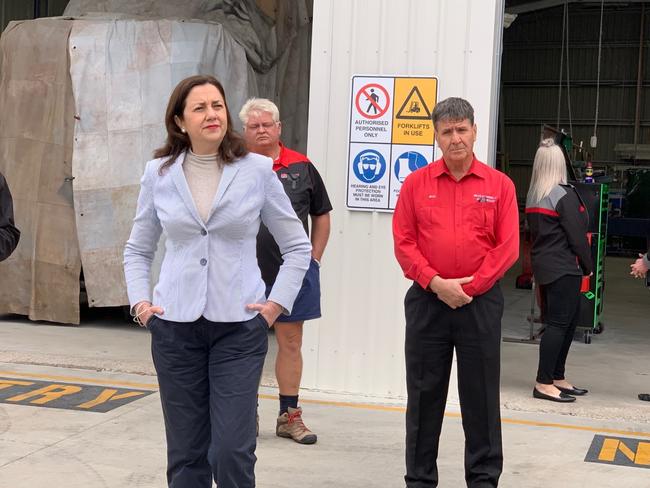 Premier Annastacia Palaszczuk and member for Maryborough Bruce Saunders outside Allweld Manufacturing in Tinana.