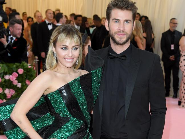 Cyrus with ex-husband Liam Hemsworth. Picture: Karwai Tang/Getty Images