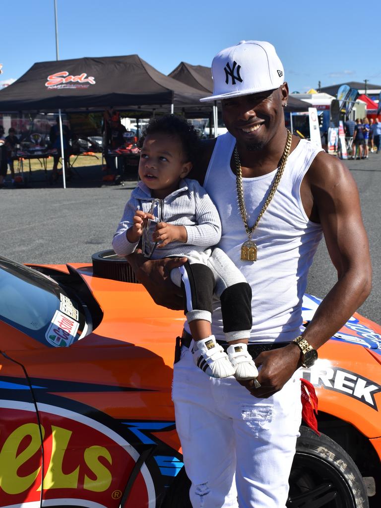 Nathenel, 2, and Deron Bute, of Slade Point at Big Boys Toys Expo at Mackay Showgrounds 2021. Photo: Janessa Ekert and Tara Miko