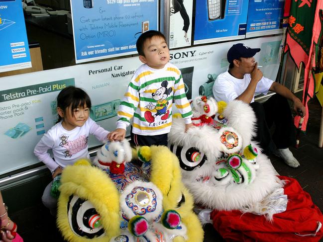 The dancing dragon takes a lunch break at the Cabramatta moon festival in 2005. Picture: James Horan