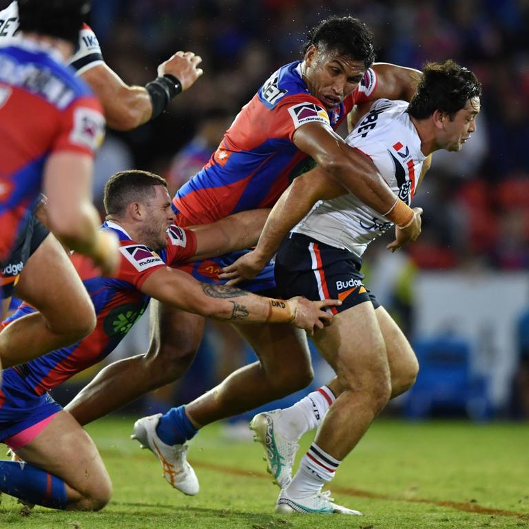 Sydney Roosters hooker Brandon Smith is brought down. Picture: NRL Photos