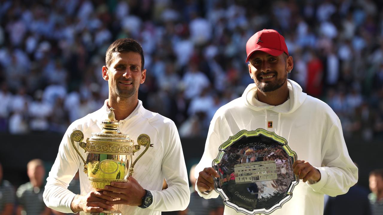 Something to aspire to.... Kyrgios stands alongside seven-time Wimbledon champion Novak Djokovic. Picture: Getty