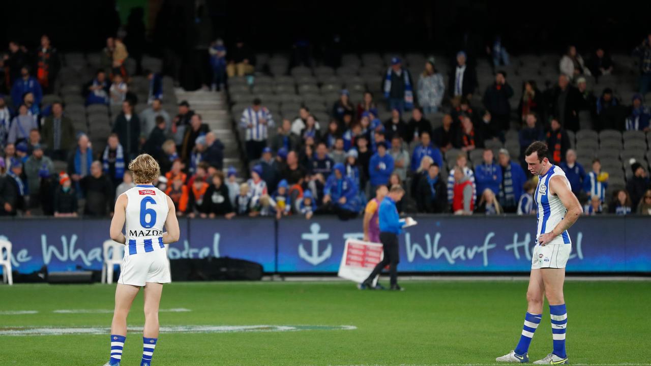 Jason Horne-Francis (left) and Todd Goldstein of the Kangaroos look dejected. Photo by Michael Willson/AFL Photos via Getty Images.