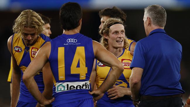 West Coast coach Adam Simpson (right) speaks with Stefan Giro, one of the five top-up players the Eagles selected on Sunday. Picture: Getty Images