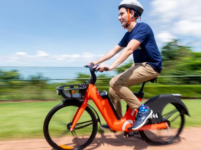 Neuron Mobility are launching a new product in Darwin. E-bikes will be available via the same system and app as their already popular e-scooters. Richard Hannah, Regional Manager at Neuron Mobility takes one of the new bikes for a spin. Picture: Che Chorley