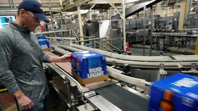 At the Anheuser-Busch brewery in Fort Collins, Colorado, cases of Bud Light beer move down a conveyor belt. Picture: Reuters.