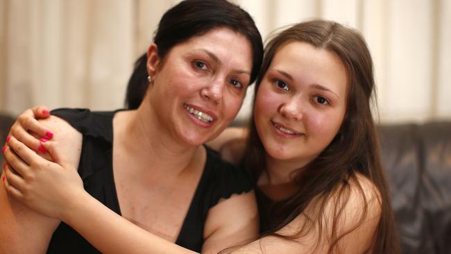 Roberta Williams with daughter Dhakota, whose christening was MCed by Lawyer X. Picture: Bradley Hunter