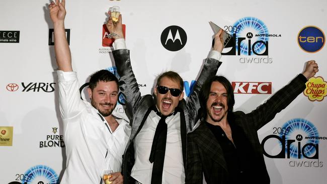 Silverchair band members Chris Joannou, Daniel Johns and Ben Gillies pose with their awards at the 2007 ARIA Awards in Sydney, Australia. Picture: Don Arnold/WireImage