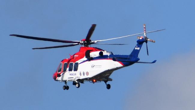 The Queensland Government Air (GQAir) rescue helicopter transports a critically injured man from Ingham Hospital to Townsville University Hospital on Thursday afternoon. Picture: Cameron Bates