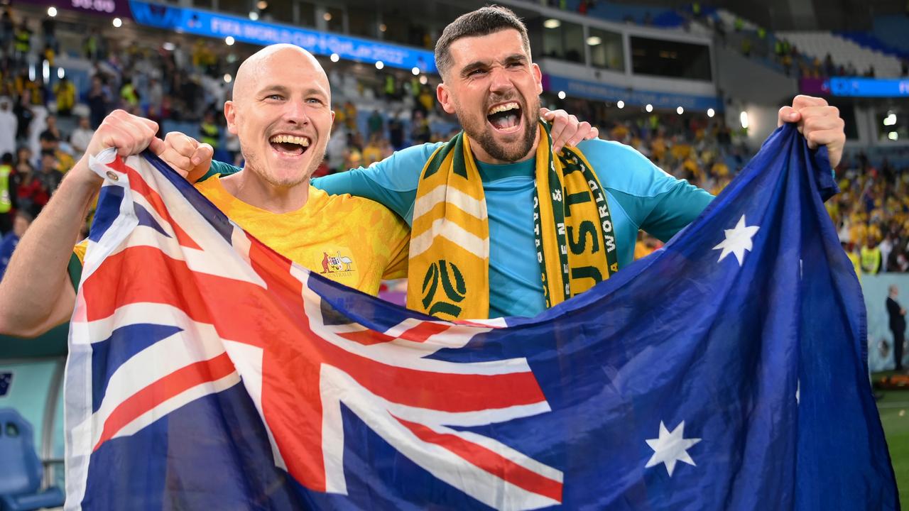AL WAKRAH, QATAR – NOVEMBER 30: Aaron Mooy (L) and Mathew Ryan of Australia celebrate after the 1-0 win during the FIFA World Cup Qatar 2022 Group D match between Australia and Denmark at Al Janoub Stadium on November 30, 2022 in Al Wakrah, Qatar. (Photo by Shaun Botterill – FIFA/FIFA via Getty Images)
