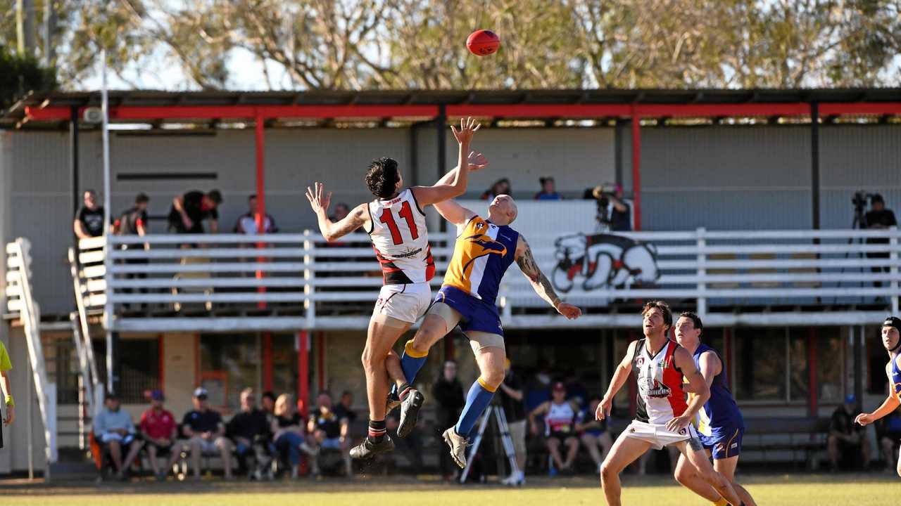 FLYING HIGH: The Waves' Klint Wagstaff and Brothers Bulldogs player Tristan Taylor compete for the ball last season. The sides meet tomorrow. Picture: Brian Cassidy