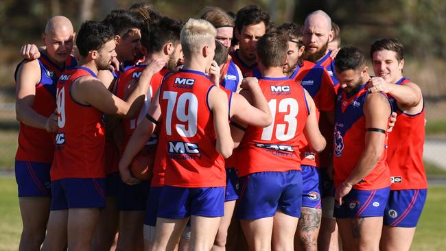 Mernda players come together before a Northern Football League game. Picture: Nathan McNeill