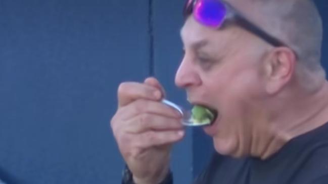 Joe Rumoro thought he’d found a quiet spot at Princes Park to enjoy his snack. Picture: Instagram