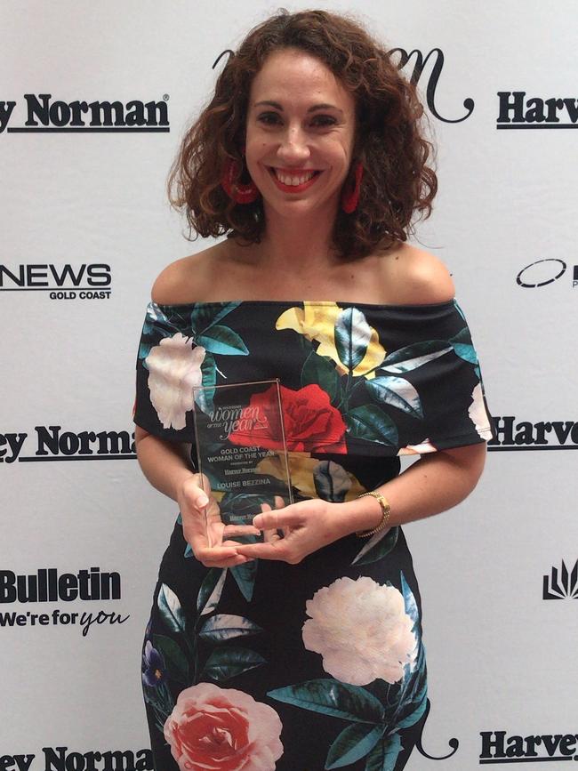 Gold Coast Woman of the Year winner Louise Bezzina with her award.