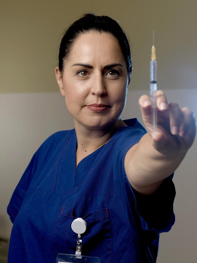 Central Adelaide Local Health Network Rebecca Badcock poses for a photo as part of SA Health’s coronavirus vaccination promotion campaign. Picture: Naomi Jellicoe