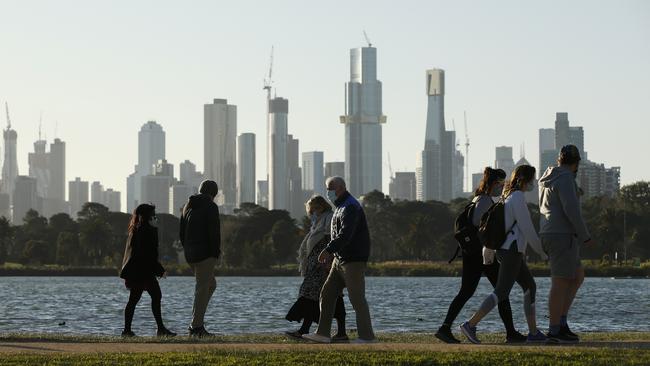 People exercising at Albert Park Lake in Melbourne, Victoria. Picture: NCA NewsWire / Daniel Pockett