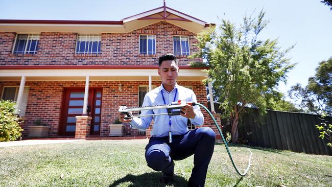 Sydney Water Community Water Officer visiting a home in Sydney’s west. Tough fines will apply to people flouting Level 2 restrictions. Picture: Sam Ruttyn