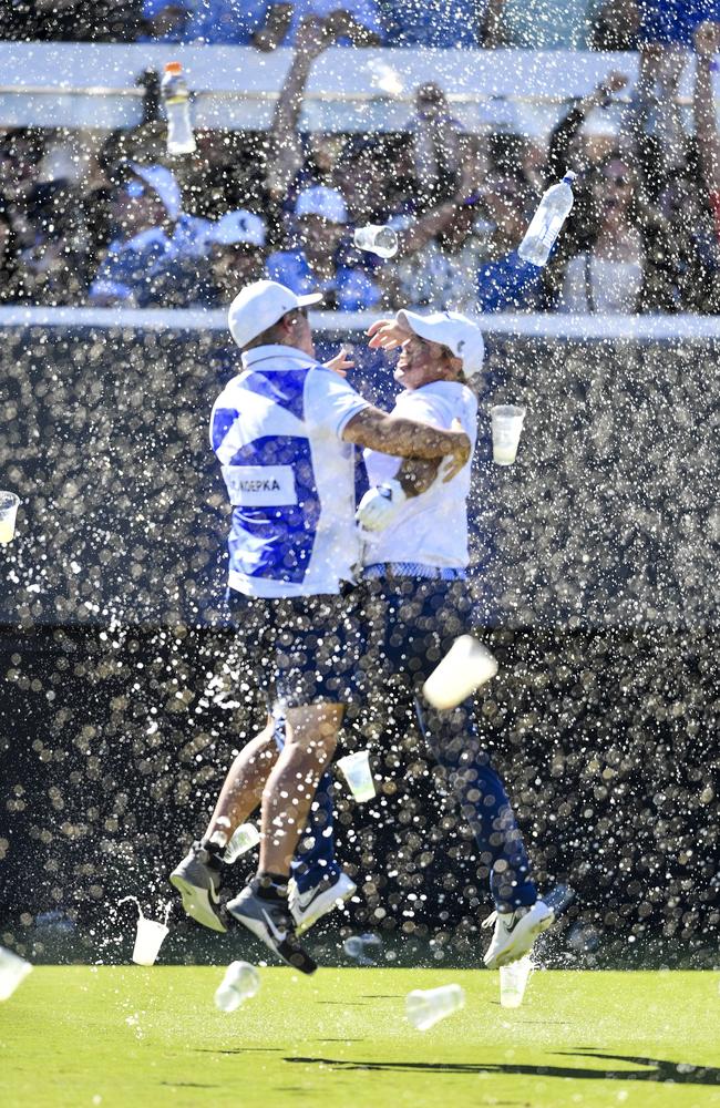 Chase Koepka of the Smash celebrates a hole in one with his caddie on the 12th showered in beer from the crowd during day three of LIV Golf Adelaide at The Grange Golf Course on April 23, 2023 in Adelaide. Picture: Mark Brake/Getty Images